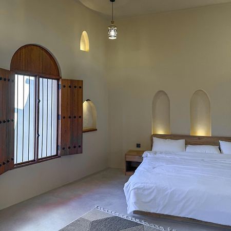 بيت أرض الثراء Rich Land House Nizva Dış mekan fotoğraf