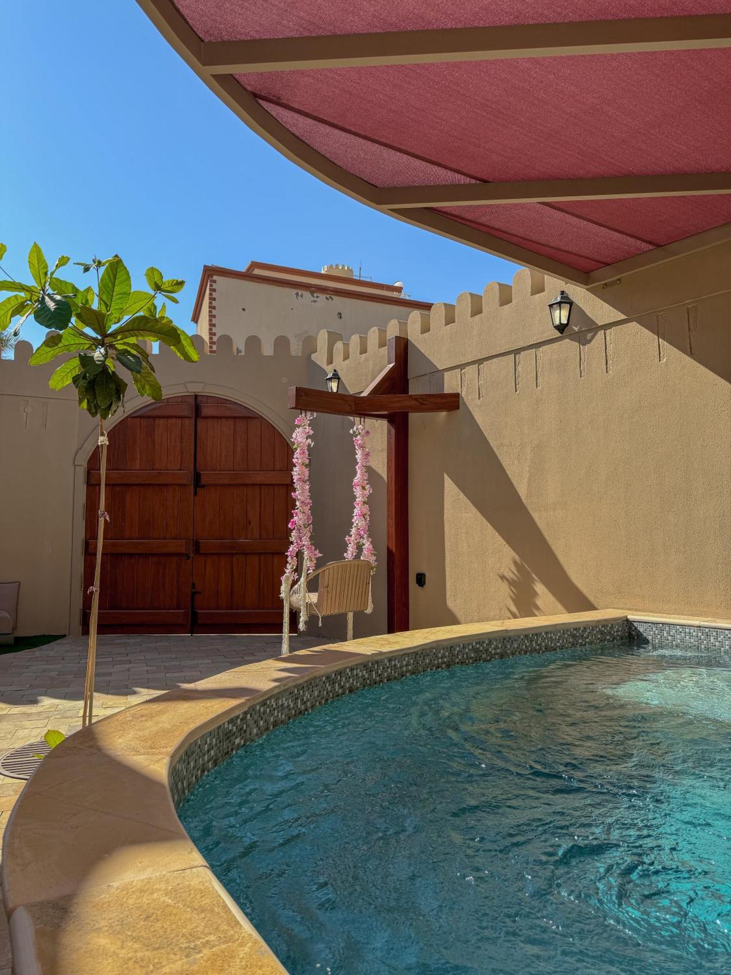 بيت أرض الثراء Rich Land House Nizva Dış mekan fotoğraf